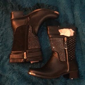 Black faux leather boots with rhinestones.